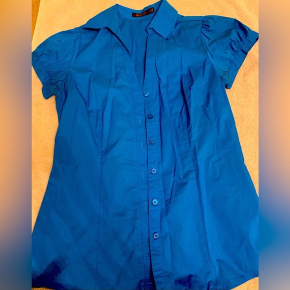 Beautiful dress shirt and coordinating sweater vest. Like new!